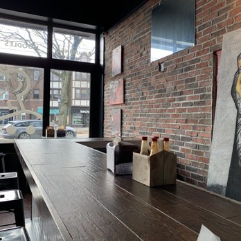 Humpty's Dumplings - Dining area with bar stool seating - New American Near Me - Glenside, Pennsylvania