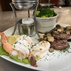 Cattlemen's Cut Steakhouse - Steam shrimp lobster style with 8 ounce tenderloin with fresh garlic mushrooms