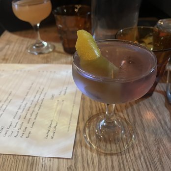 Joseph Leonard - Vesper-type drink in the front and moonshine drink in the back - New American Near Me - New York, New York Joseph Leonard - Vesper-type drink in the front and moonshine drink in the back - New American Near Me - New York, New York