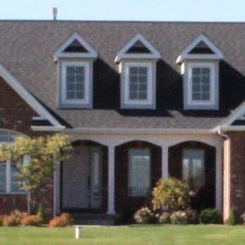 Paradise Builders - the front of a brick home - General Contractors Near Me - Lowell, Indiana