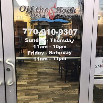 Off The Hook Fish Shrimp & Wings  - Hours posted on the door. - Seafood Near Me - Lawrenceville, Georgia