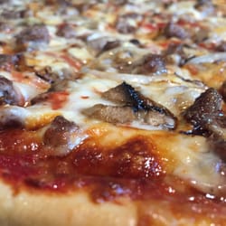Papa George Pizza - This was an amazing pizza.  Perfect cheese and sauce. The toppings were delicious and the crust was outstanding.  Try it !!!