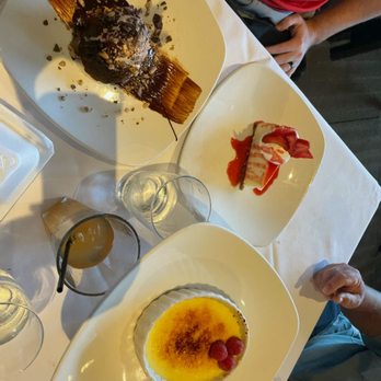 Chart House - Lava cake, cheesecake, and creme brulee....all delish! - Seafood Near Me - Melbourne, Florida Chart House - Lava cake, cheesecake, and creme brulee....all delish! - Seafood Near Me - Melbourne, Florida