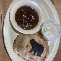 Beef pastie, gravy, and coleslaw