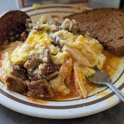 Manna Restaurant - Sausage egg and grits with toast.