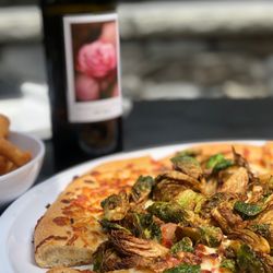 Michael Angelo's Winery - Bacon and Brussels sprout pizza, truffle fries and rose wine.