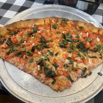 Slices Pizza - Margarita Pizza Slice - Pizza Near Me - Melbourne, Florida Slices Pizza - Margarita Pizza Slice - Pizza Near Me - Melbourne, Florida