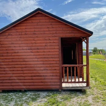 Premier Custom Cabins - a small cabin in a field - General Contractors Near Me - London, Kentucky Premier Custom Cabins - a small cabin in a field - General Contractors Near Me - London, Kentucky