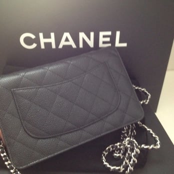 Chanel - Posterior view. Chanel wallet purse also called wallet on chain in classic quilt black caviar with silver hardware - Women's Clothing Near Me - Costa Mesa, California