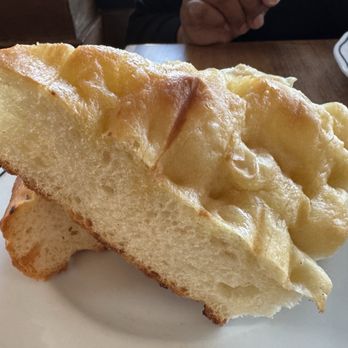 Sfizio - Grilled house baked focaccia - Italian Near Me - Oakland, California Sfizio - Grilled house baked focaccia - Italian Near Me - Oakland, California