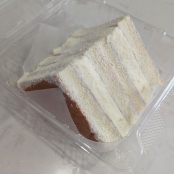 Song Kee Dessert - Found this cream cheese sandwich in the display next to counter! (Light whipped cream cheese sandwiched in between two sponge cakes) - Desserts Near Me - Honolulu, Hawaii Song Kee Dessert - Found this cream cheese sandwich in the display next to counter! (Light whipped cream cheese sandwiched in between two sponge cakes) - Desserts Near Me - Honolulu, Hawaii