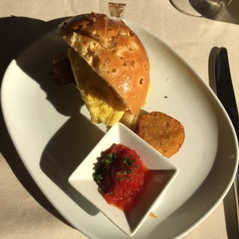 Tableau - Half the breakfast sandwich. Delicious hash brown! - Breakfast & Brunch Near Me - Las Vegas, Nevada