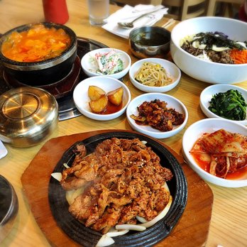 Choi's Garden - Stir Fried Spicy Pork (bottom), Soft Tofu Stew (left) and Bibimbap (top) - Korean Near Me - Honolulu, Hawaii Choi's Garden - Stir Fried Spicy Pork (bottom), Soft Tofu Stew (left) and Bibimbap (top) - Korean Near Me - Honolulu, Hawaii