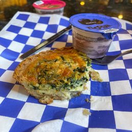Spinach and cheese quiche with yogurt on the side Spinach and cheese quiche with yogurt on the side
