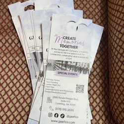 Flyers attached to condo garage doors in a gated community. Most of them were on the ground today.