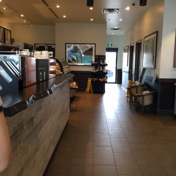 Starbucks - a woman standing in a coffee shop - Coffee & Tea Near Me - Vancouver, British Columbia Starbucks - a woman standing in a coffee shop - Coffee & Tea Near Me - Vancouver, British Columbia