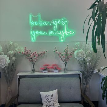 4Seasons Tea Cafe - Cute photo op area with a couch and sign - Bubble Tea Near Me - Anaheim, California