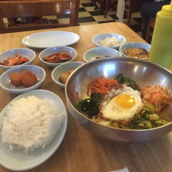 Korea House - Bimbimbap with accompanying dishes - Korean Near Me - Austin, Texas Korea House - Bimbimbap with accompanying dishes - Korean Near Me - Austin, Texas