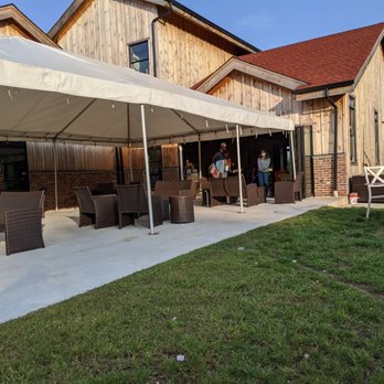 Sannino Vineyard - Outdoor space in the shade. - Wine Tasting Room Near Me - Cutchogue, New York Sannino Vineyard - Outdoor space in the shade. - Wine Tasting Room Near Me - Cutchogue, New York