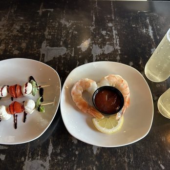 Macallans Public House - Appetizer: caprese and shrimp cocktail with champagne - Irish Pub Near Me - Brea, California