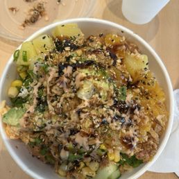 Spicy tuna, shrimp, cucumber, pineapple , orange, corn, avocado, rice.