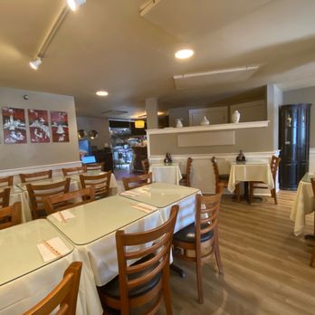 Little Saigon - an empty restaurant with tables and chairs - Vietnamese Near Me - Brunswick, Maine