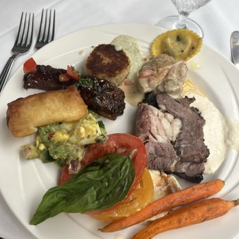 Michael's On East - Prime rib, ravioli, ribs, blintz, crab cake, chicken, veggies and salad - New American Near Me - Sarasota, Florida Michael's On East - Prime rib, ravioli, ribs, blintz, crab cake, chicken, veggies and salad - New American Near Me - Sarasota, Florida