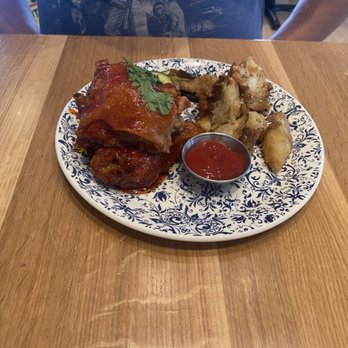 Tupelo Honey Southern Kitchen & Bar - Sweet & Spicy Chicken with Rosemary & Parmesan Crispy Potatoes* - New American Near Me - Irving, Texas Tupelo Honey Southern Kitchen & Bar - Sweet & Spicy Chicken with Rosemary & Parmesan Crispy Potatoes* - New American Near Me - Irving, Texas