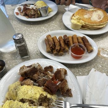 Julie'Z Restaurant - Lechilog (Lechon kawali and adobo fried rice) Shanghai Lumpia Pancakes - Filipino Near Me - Kapolei, Hawaii Julie'Z Restaurant - Lechilog (Lechon kawali and adobo fried rice) Shanghai Lumpia Pancakes - Filipino Near Me - Kapolei, Hawaii