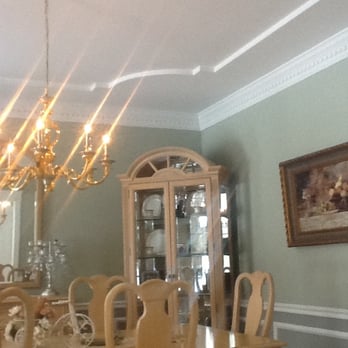 Farrell Plastering - a formal dining room with a chandelier - Drywall Installation & Repair Near Me - Lancaster, Massachusetts