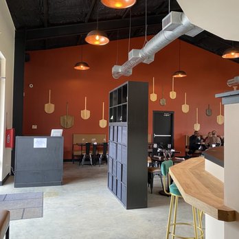 Sauced Up - Partial view of seating area for restaurant - Pizza Near Me - Magnolia, Texas