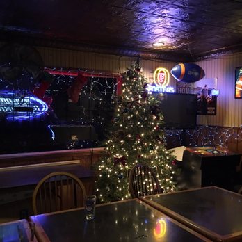 Four Mile Bar - a christmas tree and neon signs - Dive Bars Near Me - Las Vegas, Nevada Four Mile Bar - a christmas tree and neon signs - Dive Bars Near Me - Las Vegas, Nevada