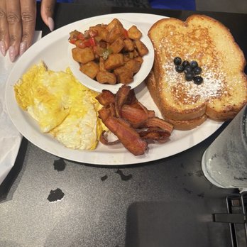 Grits and Eggs Breakfast Kitchen - French toast with eggs, breakfast potatoes and bacon. - Breakfast & Brunch Near Me - Atlanta, Georgia Grits and Eggs Breakfast Kitchen - French toast with eggs, breakfast potatoes and bacon. - Breakfast & Brunch Near Me - Atlanta, Georgia