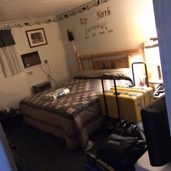 Atlanta Motel - Room 106, a room with a King bed - Hotels Near Me - Atlanta, Michigan