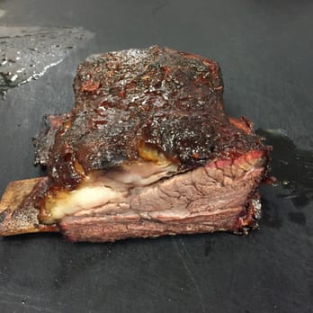 Kenjo's BBQ - a piece of meat on a grill - Barbeque Near Me - Brazoria, Texas Kenjo's BBQ - a piece of meat on a grill - Barbeque Near Me - Brazoria, Texas