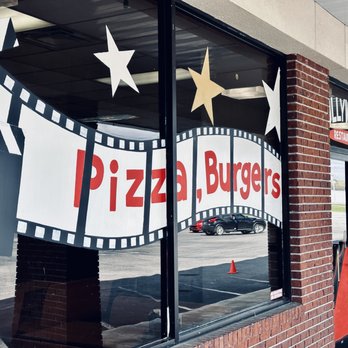 Hollywood’s Restaurant - a movie strip and a sign that says pizza burgers - Pizza Near Me - Stevenson, Alabama Hollywood’s Restaurant - a movie strip and a sign that says pizza burgers - Pizza Near Me - Stevenson, Alabama