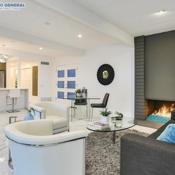 Ringo General Contracting - a living room with a fireplace - General Contractors Near Me