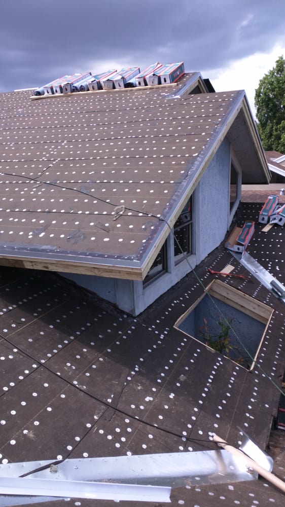 Slide of Riggs Roofing