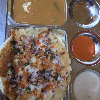 Vik's Chaat - Uttapam with curry, spicy sauce, delicious coconut chutney - Indian Near Me - Berkeley, California Vik's Chaat - Uttapam with curry, spicy sauce, delicious coconut chutney - Indian Near Me - Berkeley, California