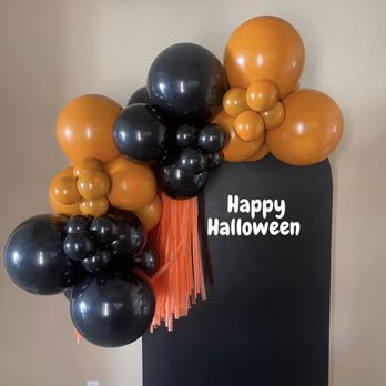 Make It Pop - a blackboard with a bunch of balloons attached to it - Balloon Services Near Me Make It Pop - a blackboard with a bunch of balloons attached to it - Balloon Services Near Me