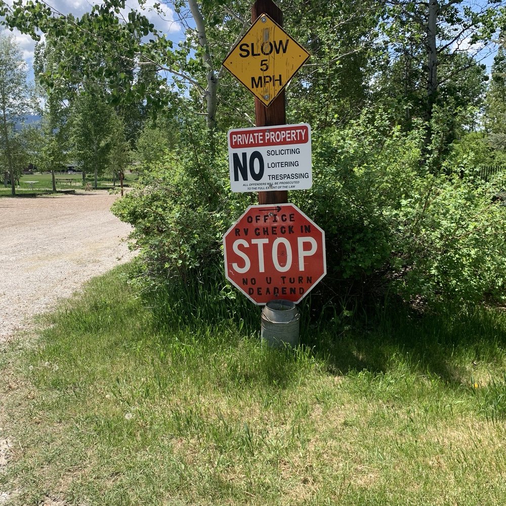 Aspen Grove RV Park - Sign in front of park - RV Parks Near Me - Alpine, Wyoming