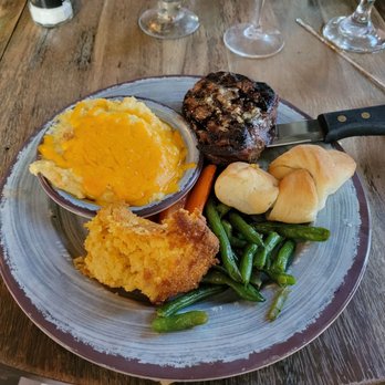 Ivy on the Square - Steak with grits, green beans and carrots served with bread - Southern Near Me - Ocala, Florida