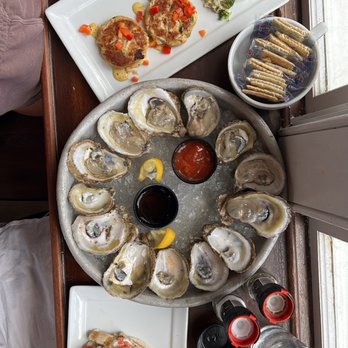 Pearlz - A lil bit of everything and it was delish. Don't mind the half eaten oysters, we couldn't wait. - Seafood Near Me - Charleston, South Carolina Pearlz - A lil bit of everything and it was delish. Don't mind the half eaten oysters, we couldn't wait. - Seafood Near Me - Charleston, South Carolina