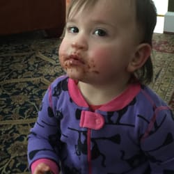 Prides Crossing Confections - Gabriela loving her chocolate from prides crossing confections!