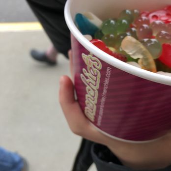 Menchie's Frozen Yogurt - a person holding a bowl of gummy bears - Desserts Near Me - Spokane, Washington Menchie's Frozen Yogurt - a person holding a bowl of gummy bears - Desserts Near Me - Spokane, Washington