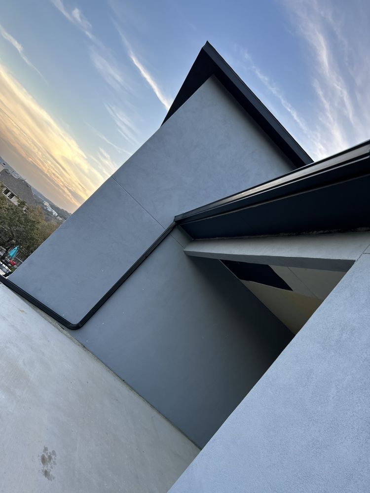 Slide of Gonzalez Seamless Rain Gutters