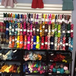 Unwind Yarn Shop - Hand dyed yarns by Brediculous & MadTosh.  Woolstok Light, HiKoo CoBaSi, Universal Bamboo Sock