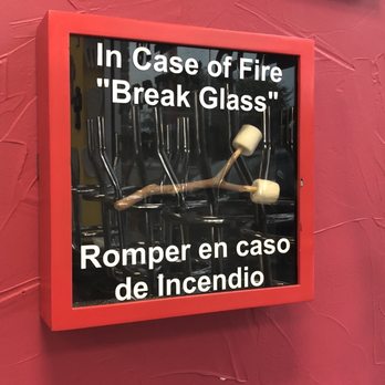 Guanataco Express - a sign in case of fire break glass - Tacos Near Me - Grand Prairie, Texas