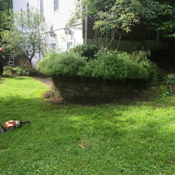 CPM Property Services - a man mowing the lawn - Lawn Services Near Me - Webster, New York