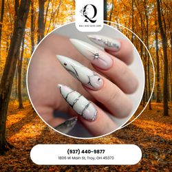 Q Nail Tanning & Skincare - White marble stilettos -- elegant swirls of stone beauty. A timeless masterpiece that turns every gesture into quiet luxury.